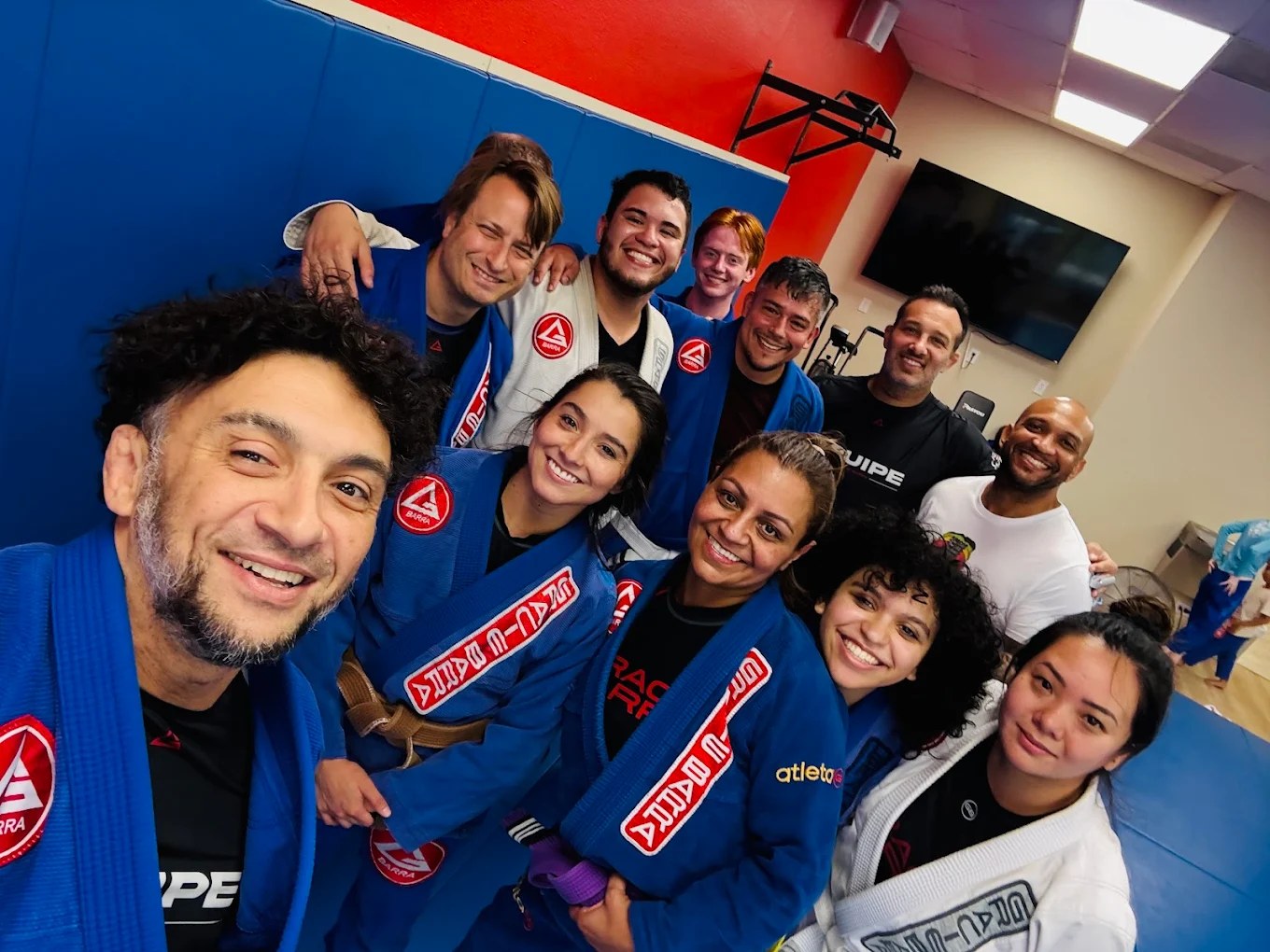 Adult Brazilian Jiu-Jitsu students training together at Gracie Barra Seminole in Longwood, a short drive north of Altamonte Springs